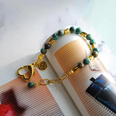 Bracelet with semi-precious stones and gold-plated elements