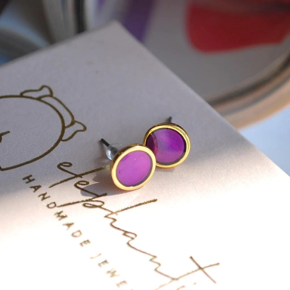 Earrings studded with purple enamel