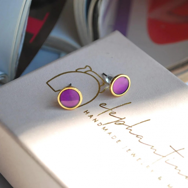 Earrings studded with purple enamel