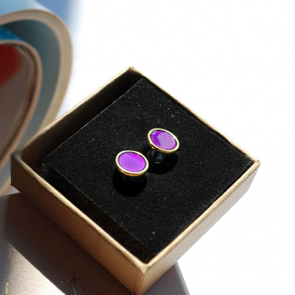 Earrings studded with purple enamel