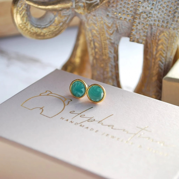 Earrings studded with green enamel