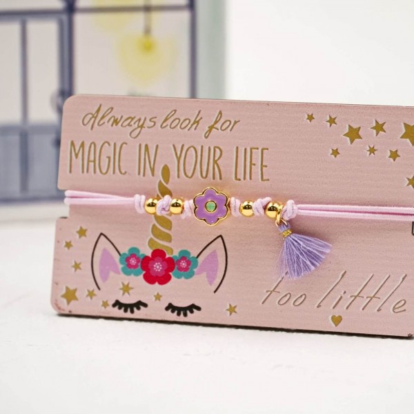 Children's purple flower bracelet with tassel